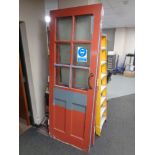 A pair of Edwardian painted interior vestibule doors with glass inset panels, height 212 cm.