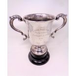 A silver twin handled trophy cup engraved Empire Ball room, Chester Le Street, Challenge Cup 1934,