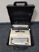An Olivetti Lettera 35 manual typewriter in case