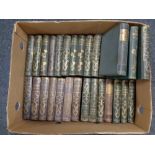 A box containing 31 twentieth century volumes with gilded spines, Thackeray, Dickens,