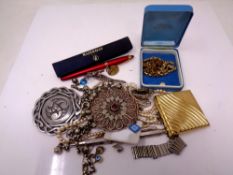 A small collection of costume jewellery : necklaces etc