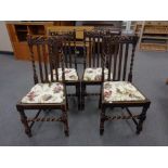 A set of four Edwardian oak barley twist dining chairs