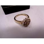 A 9ct gold diamond cluster ring