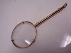 A 9ct gold monocle, 14.
