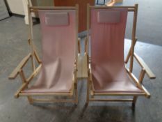 A pair of twentieth century folding garden deck chairs