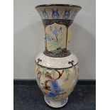 A large oriental style glazed pottery baluster vase,