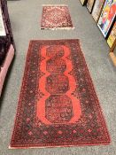 Two small Eastern rugs.
