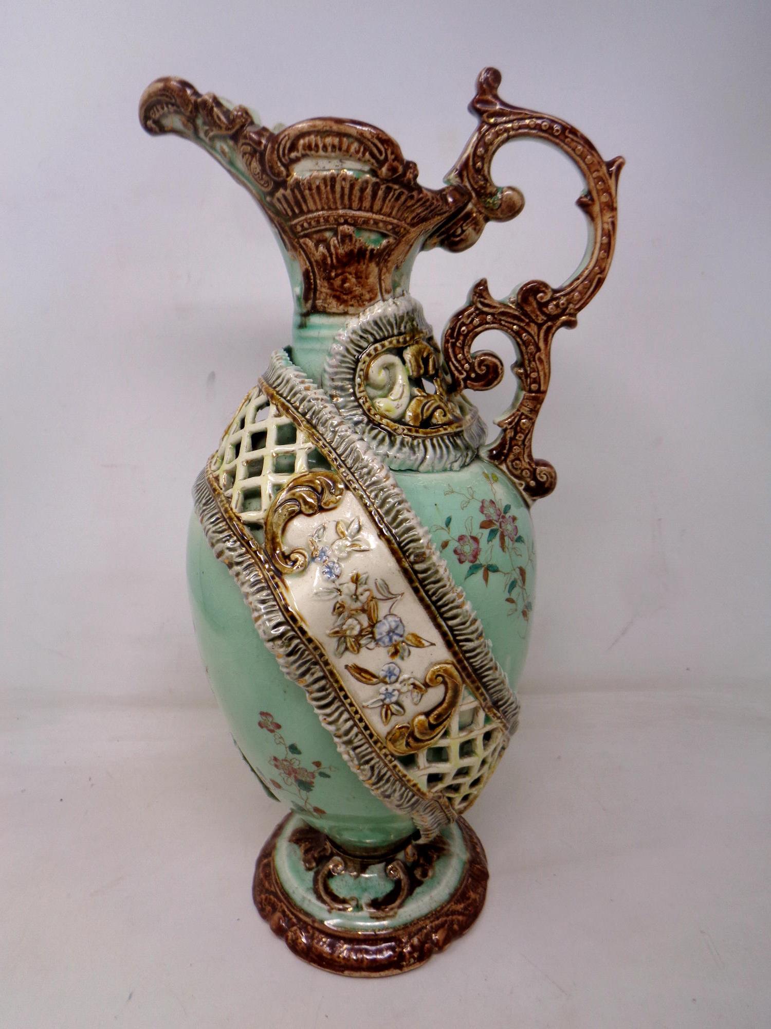 An antique glazed pottery ewer