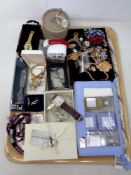A tray of wristwatches, costume jewellery, soap gift set,