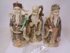 Three Oriental style figures