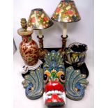 A pair of Kashmir style papier maché floral table lamps together with further lamp base,