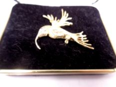 A 9ct gold bird brooch