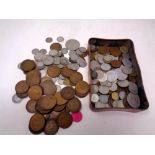A tin of antique and later foreign and English coins, silver coins, pennies,