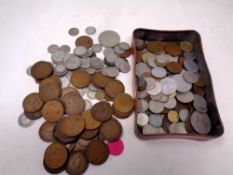 A tin of antique and later foreign and English coins, silver coins, pennies,