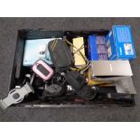 A crate of assorted digital cameras,