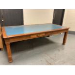 An early 20th century mahogany library table fitted with drawers.