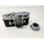 A Leica M2 Leitz Wetzlar camera, numbered 1,069,663, circa 1953, chrome, shutter working,