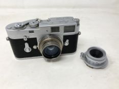 A Leica M2 Leitz Wetzlar camera, numbered 1,069,663, circa 1953, chrome, shutter working,