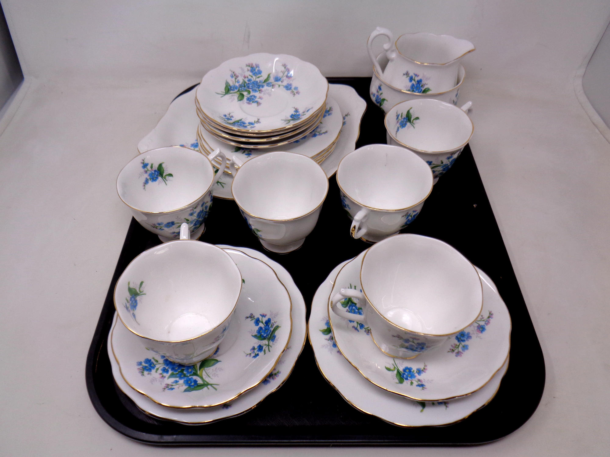 A tray of twenty one pieces of Royal Albert Forget me Not bone tea china