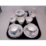 A tray of twenty one pieces of Royal Albert Forget me Not bone tea china