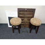 An oak glazed wall cabinet, a pair of bar stools,