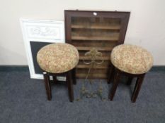 An oak glazed wall cabinet, a pair of bar stools,