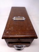 An Edwardian oak cash drawer with bell