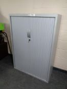 A JG double shutter door stationary cabinet with key