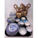 A tray of pair of continental pottery twin handled vases, oriental pattern blue and white tea china,