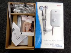 A Redring active 3505 electric shower, boxed.