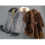 Two lady's three quarter length leather coats with faux fur trim together with faux fur coat