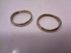 A pair solid silver love rings