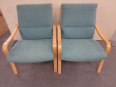 A pair of bentwood framed armchairs in turquoise fabric