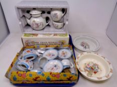 A Beatrix Potter Wedgwood child's tea set in box and a continental child's tea set