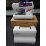 A Singer 6408 electric sewing machine in case with pedal and original retail box