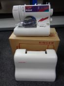 A Singer 6408 electric sewing machine in case with pedal and original retail box