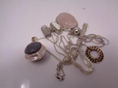 A small collection of white metal jewellery including pendants, chains,