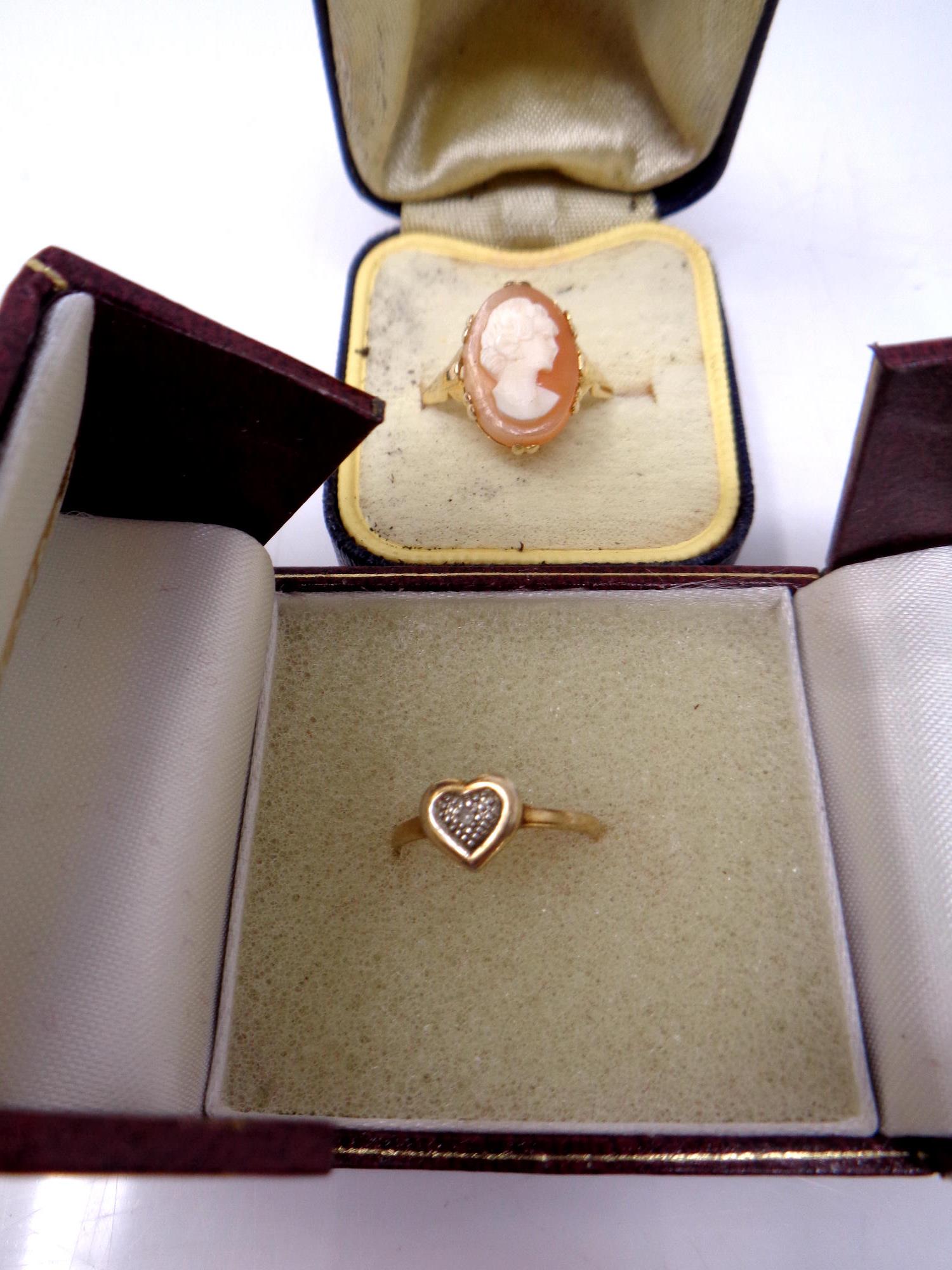 A 9ct gold cameo ring and silver gilt heart shaped ring