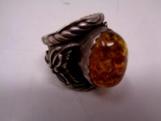 A heavy old amber ring