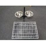 A folding metal pet cage together with a pet water bowl stand