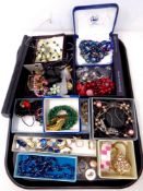 A tray of costume jewellery, bracelets, brooches,