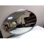 An Art Deco chrome framed bevelled mirror