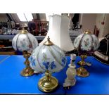 Three brass table lamps with glass shades together with two further lamps (one with shade).