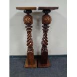 A pair of stained beech barley twist jardiniere stands
