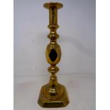 A Victorian brass candlestick, height 35.5 cm.