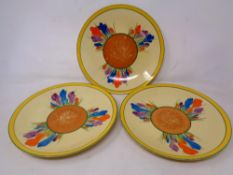 Three Clarice Cliff Crocus designed plates, diameter 23 cm.