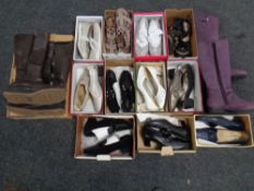 Two boxes of lady's shoes and boots