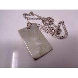 A silver ingot on chain