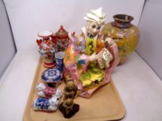 A tray of oriental wares, vases, teapot, trinket box, figures,