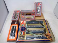 A tray of Lima engines and rolling stock to include Intercity golden series locomotives with